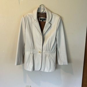 I’m selling a beige leather jacket